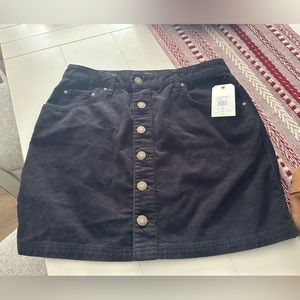 New with tags. Black corduroy skirt. Non smoking home.
